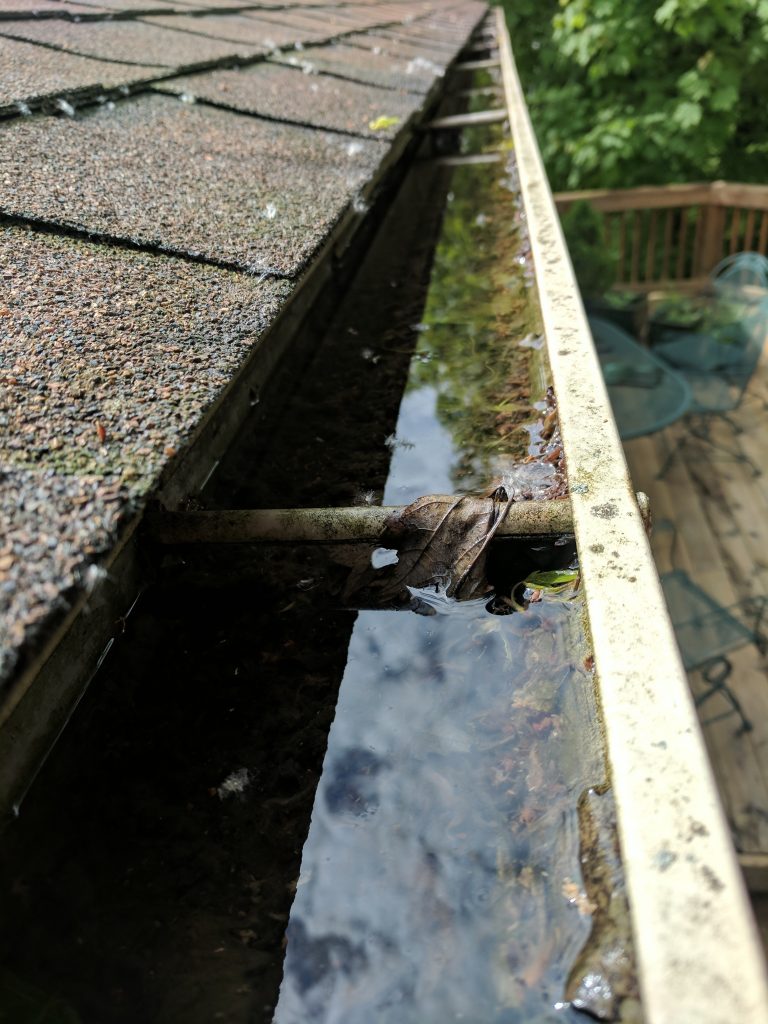 Gutters Full of Water Need Cleaning